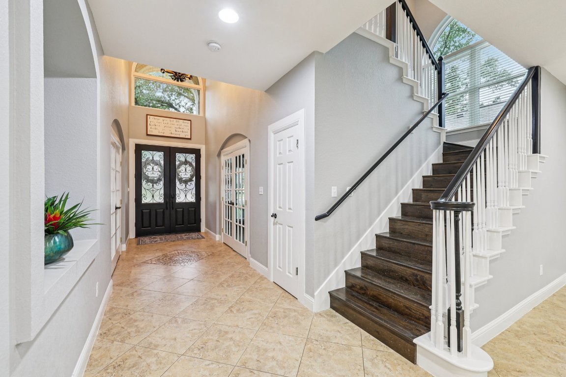 1108 Dalea Bluff Round Rock, TX 78665 - Photo 3 of 40 a view of entryway and hall with wooden floor