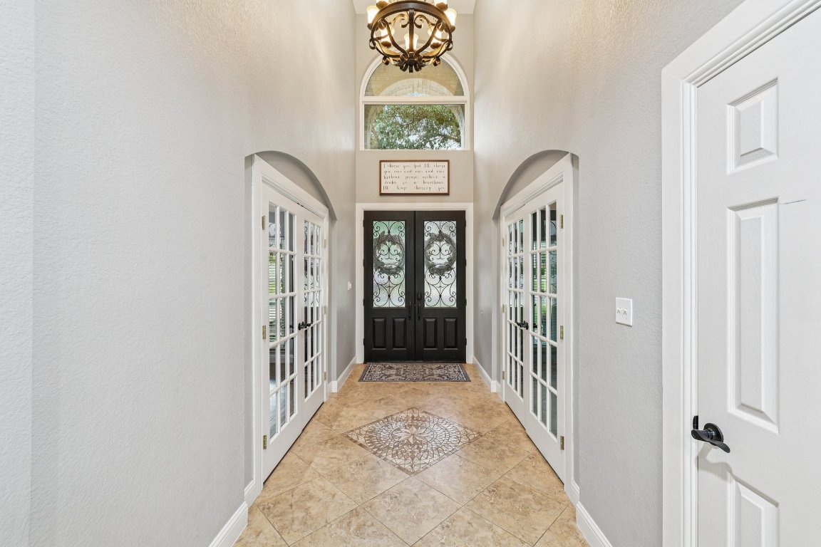 1108 Dalea Bluff Round Rock, TX 78665 - Photo 4 of 40 wooden floor with a window in a hall with an entryway