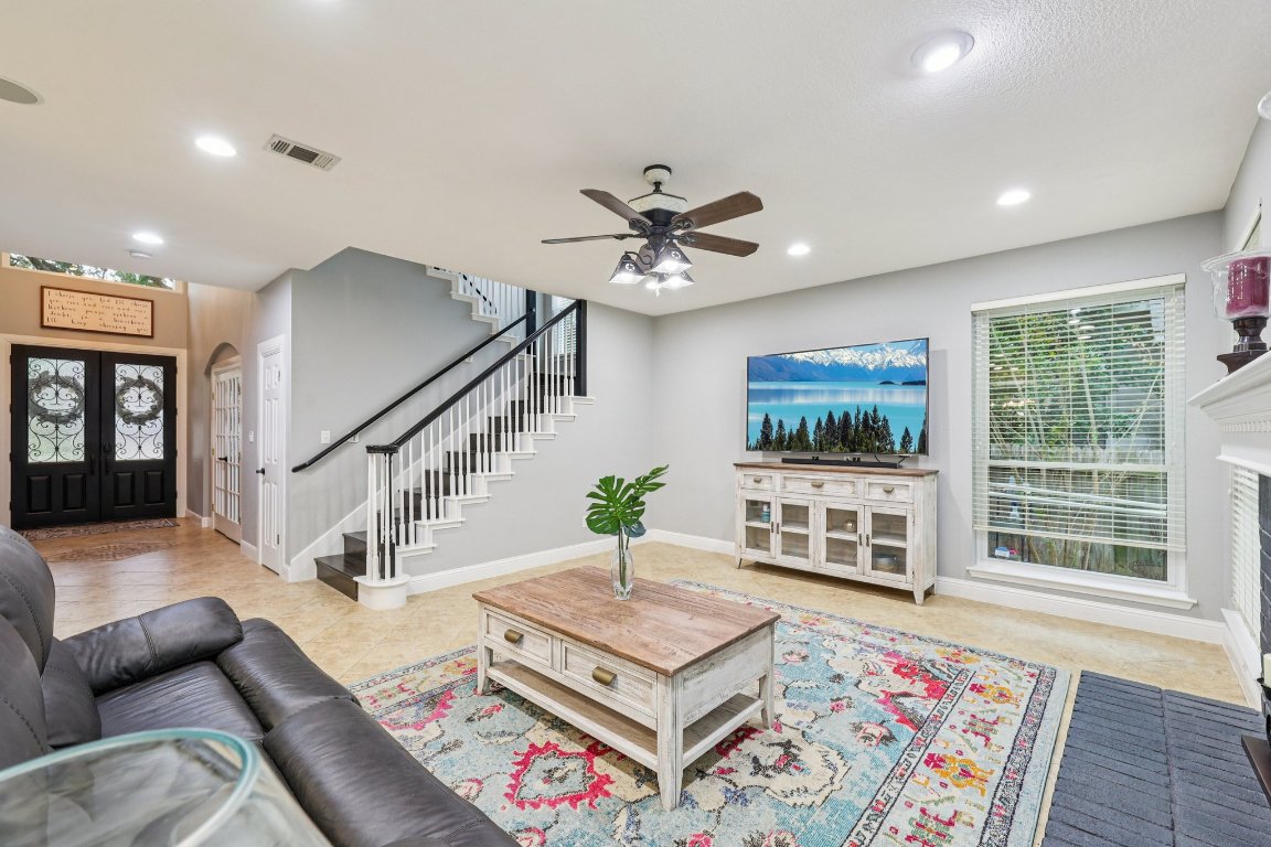 1108 Dalea Bluff Round Rock, TX 78665 - Photo 7 of 40 a living room with furniture and a flat screen tv