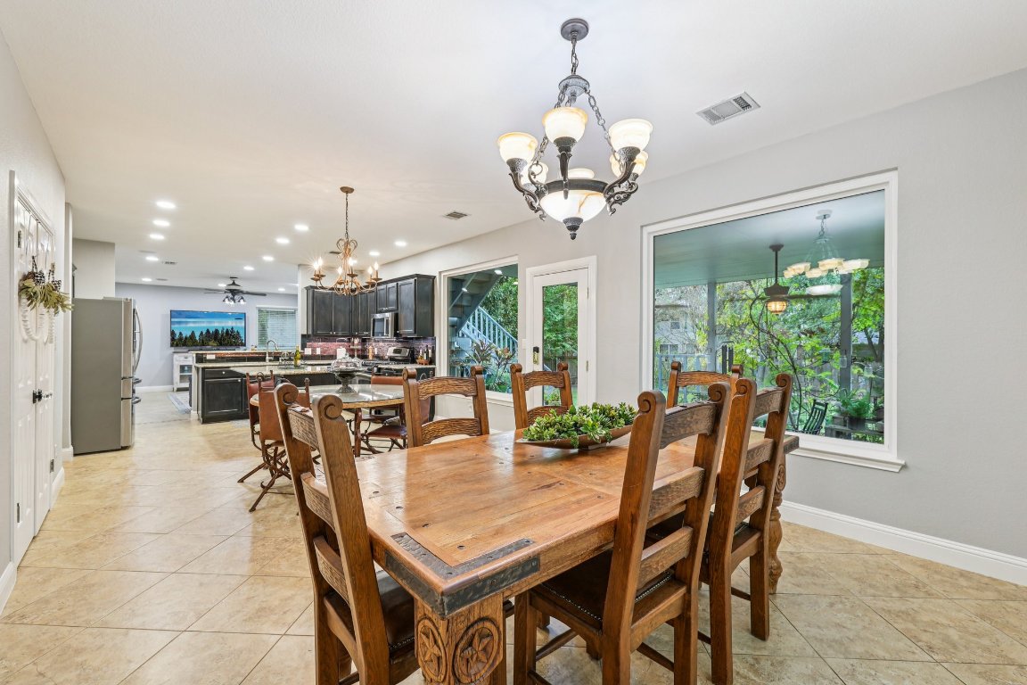 1108 Dalea Bluff Round Rock, TX 78665 - Photo 9 of 40 a view of a dining room with furniture window and outside view