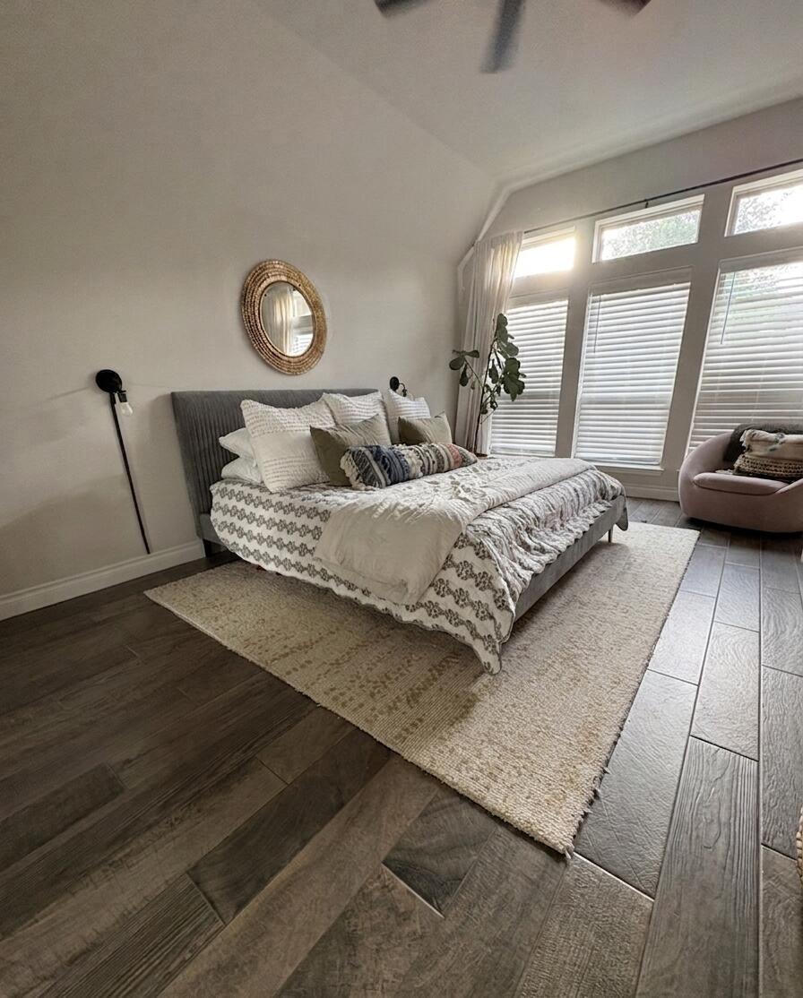 2231 Blackhawk Ridge Lane Manvel, TX 77578 - Photo 5 of 12 a living room with a bed furniture and a large window