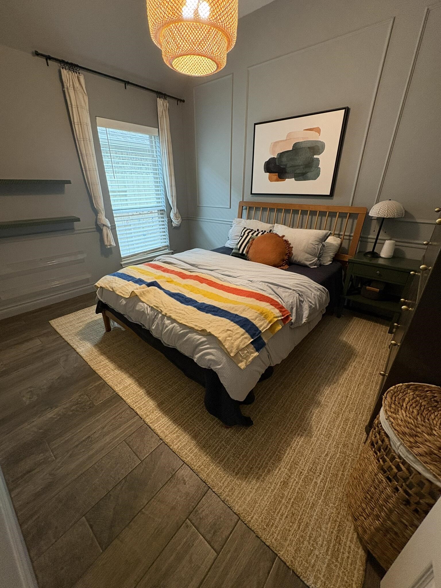 2231 Blackhawk Ridge Lane Manvel, TX 77578 - Photo 8 of 12 a bedroom with a bed and lamp