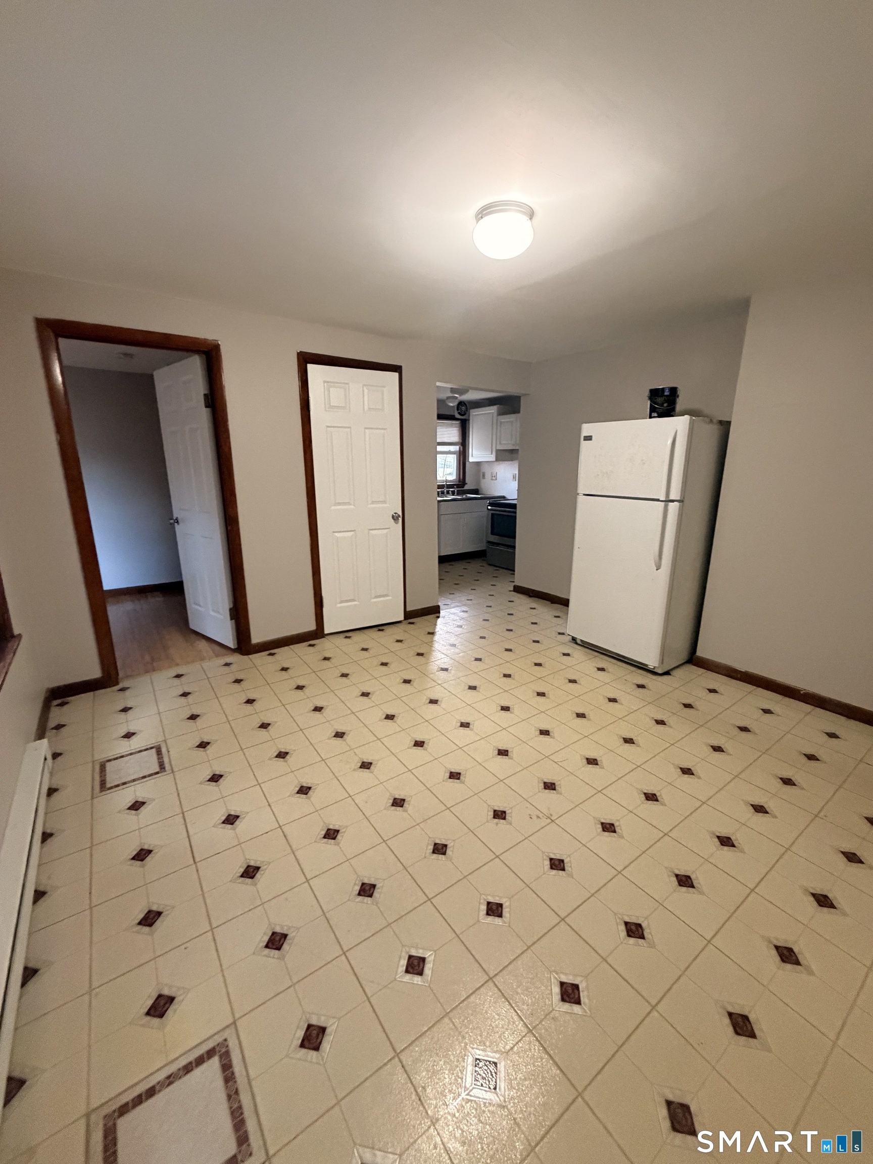 844 Field Street Naugatuck, CT 06770 - Photo 3 of 6 a bedroom with a door