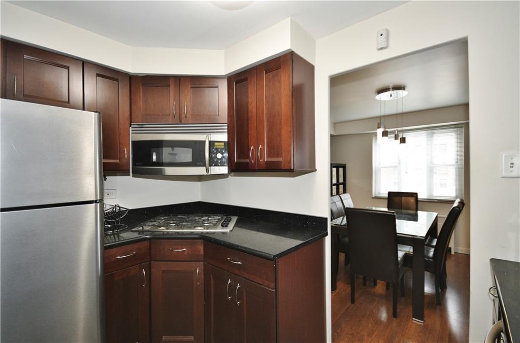 4625 Fifth Avenue, Unit 202 Pittsburgh, PA 15213 - Photo 11 of 32 Gas stove top, and microwave.