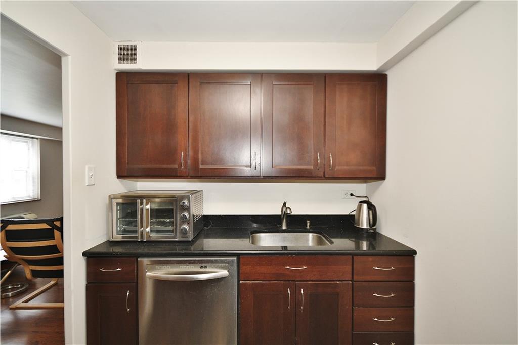 4625 Fifth Avenue, Unit 202 Pittsburgh, PA 15213 - Photo 13 of 32 Stainless dishwasher, upper & lower cabinets for storage.