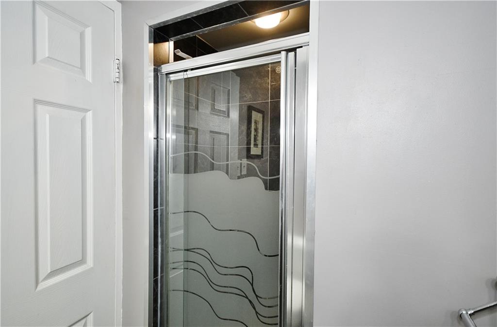 4625 Fifth Avenue, Unit 202 Pittsburgh, PA 15213 - Photo 23 of 32 Updated shower in primary.