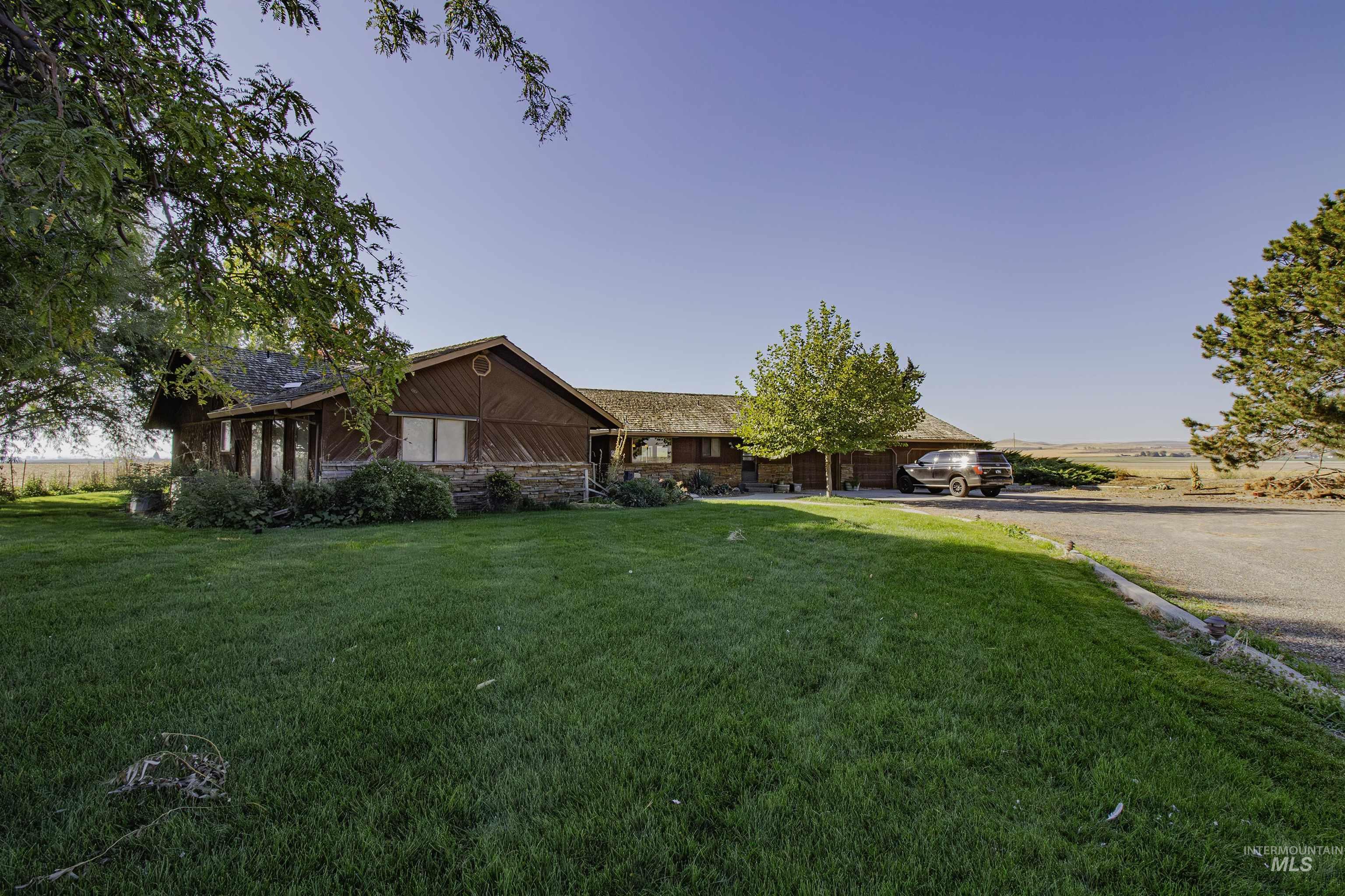 887 Overstreet Road Nyssa, OR 97913 - Photo 35 of 50 Single story home featuring a front yard and stone siding
