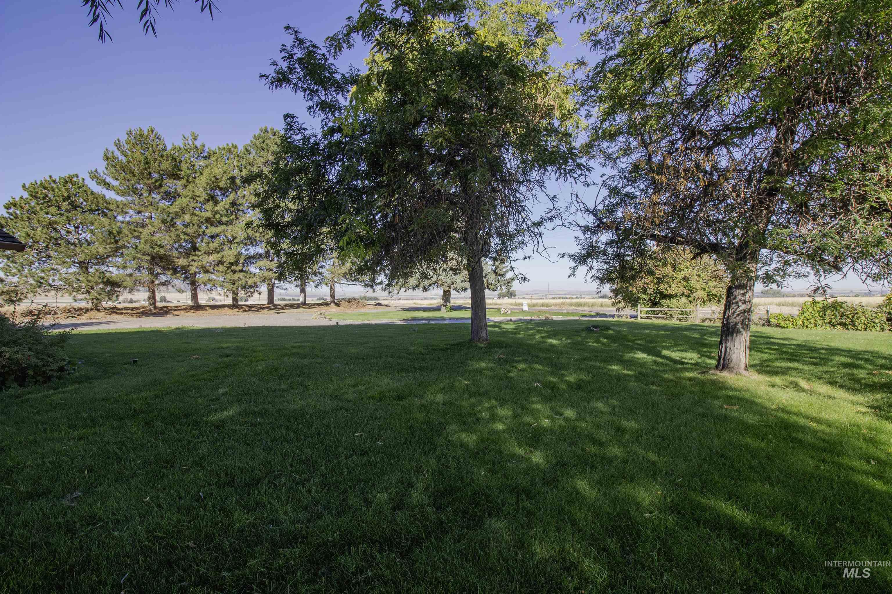 887 Overstreet Road Nyssa, OR 97913 - Photo 36 of 50 View of green lawn featuring a rural view