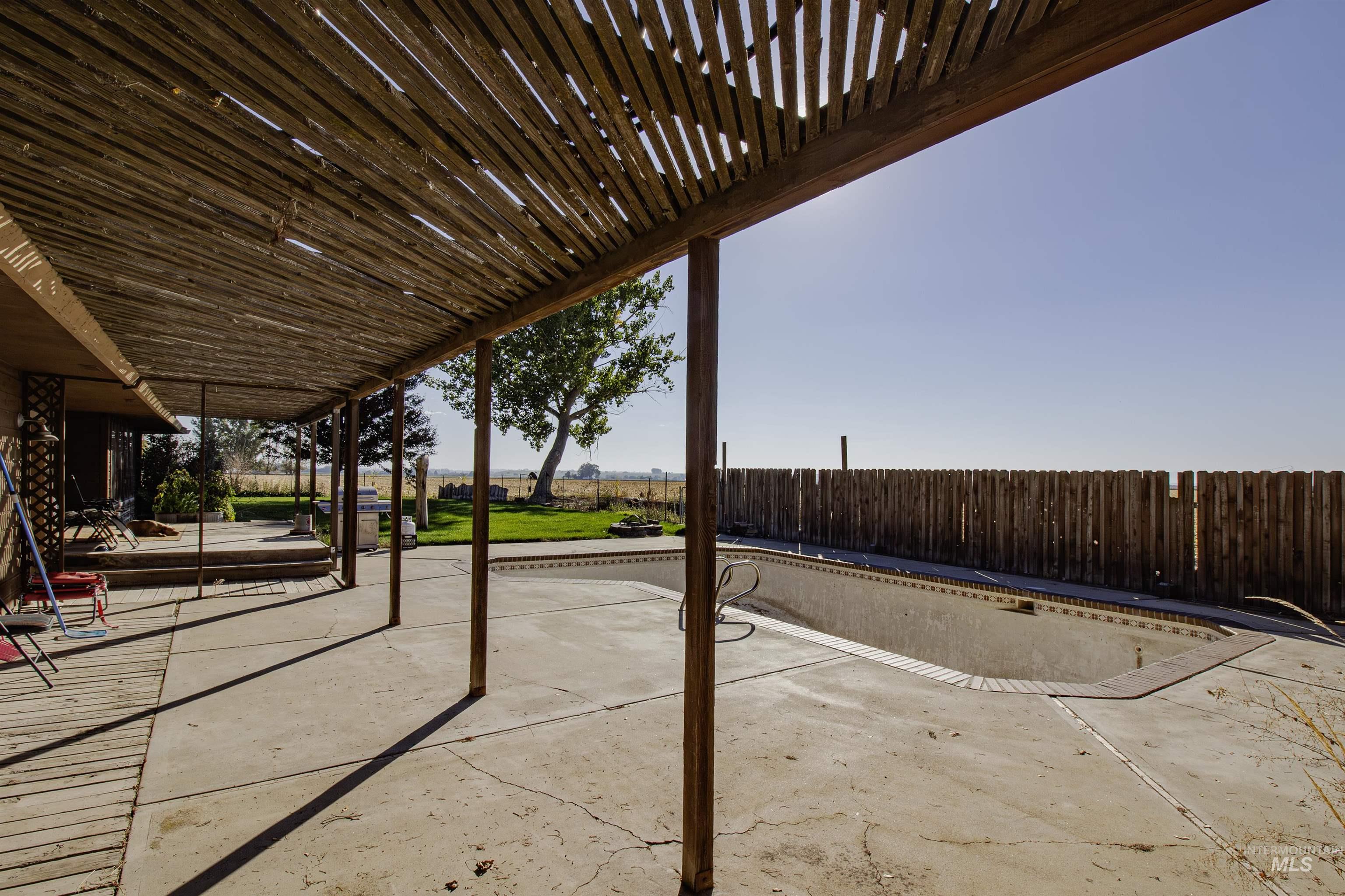 887 Overstreet Road Nyssa, OR 97913 - Photo 42 of 50 Fenced backyard with a patio area