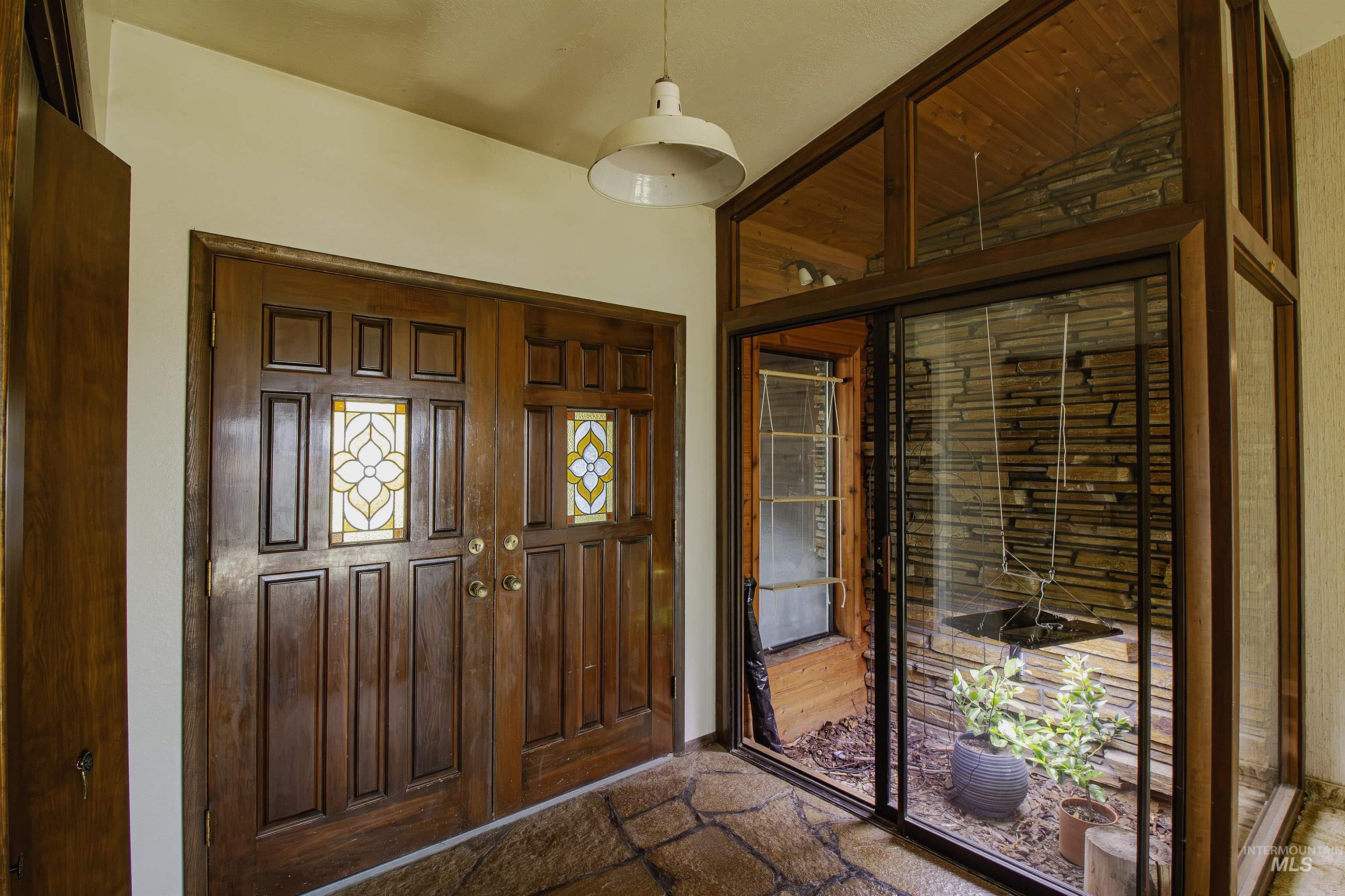 887 Overstreet Road Nyssa, OR 97913 - Photo 7 of 50 Entryway featuring stone finish floors