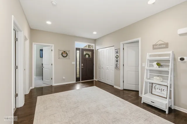 a view of a livingroom with wooden floor
