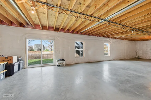 a view of a room with wooden walls