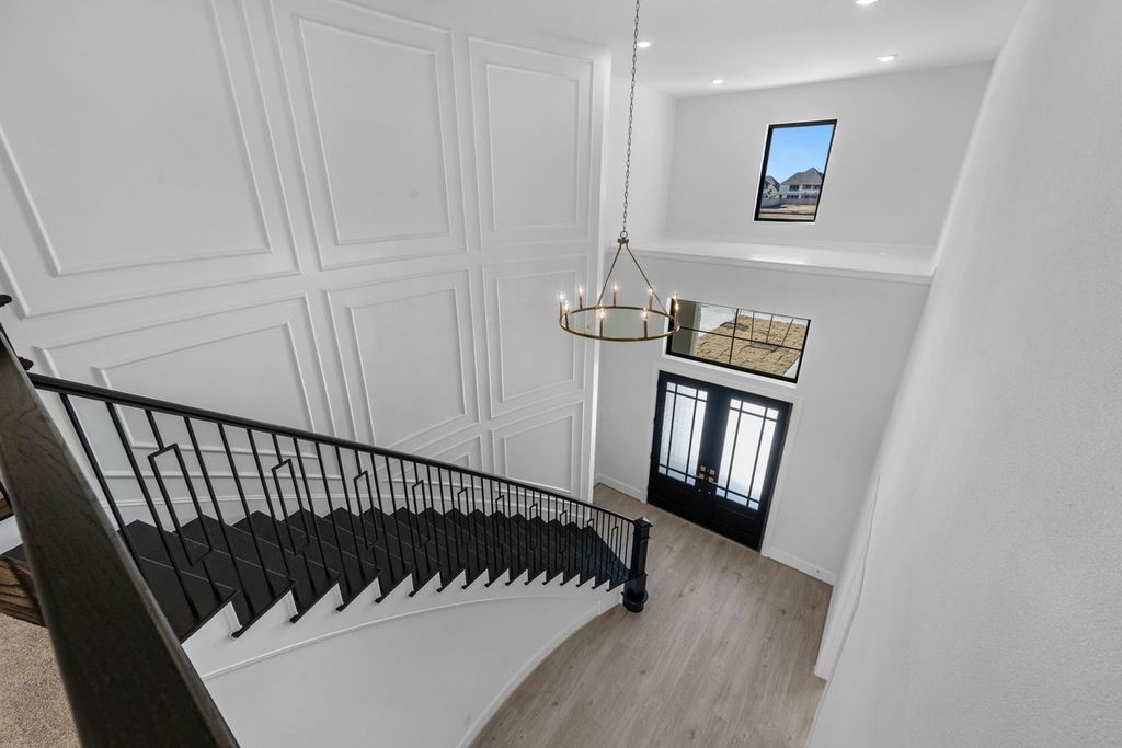 7703 Sparkle Dunn Court Fulshear, TX 77441 - Photo 19 of 26 The entry wall is a show stopper! It is so pretty!