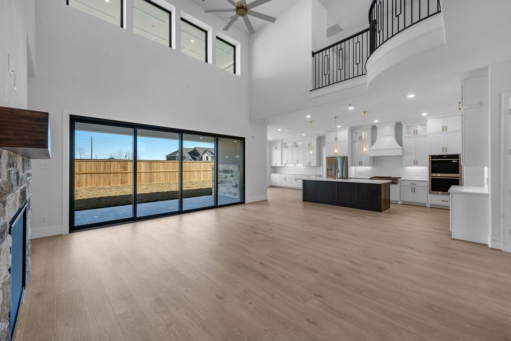 7703 Sparkle Dunn Court Fulshear, TX 77441 - Photo 2 of 26 I love the sliding doors off the back of the home