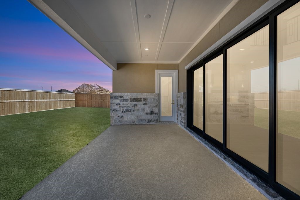 7703 Sparkle Dunn Court Fulshear, TX 77441 - Photo 24 of 26 the back porch has hook up already installed for your outdoor kitchen