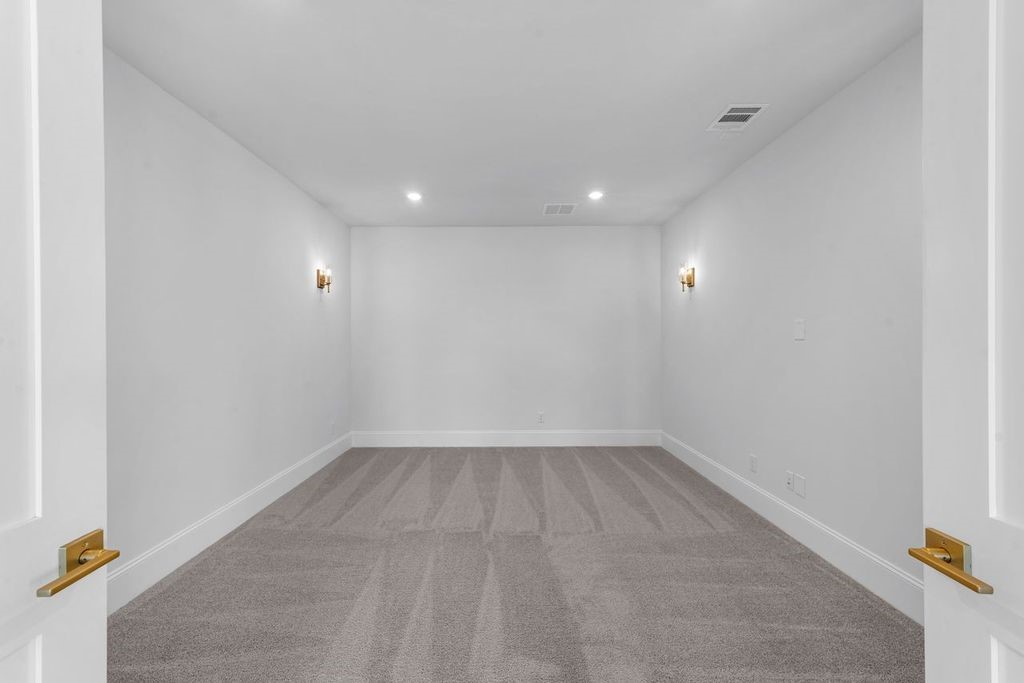 7703 Sparkle Dunn Court Fulshear, TX 77441 - Photo 5 of 26 Private study at the front of the home has double doors and plenty of natural light