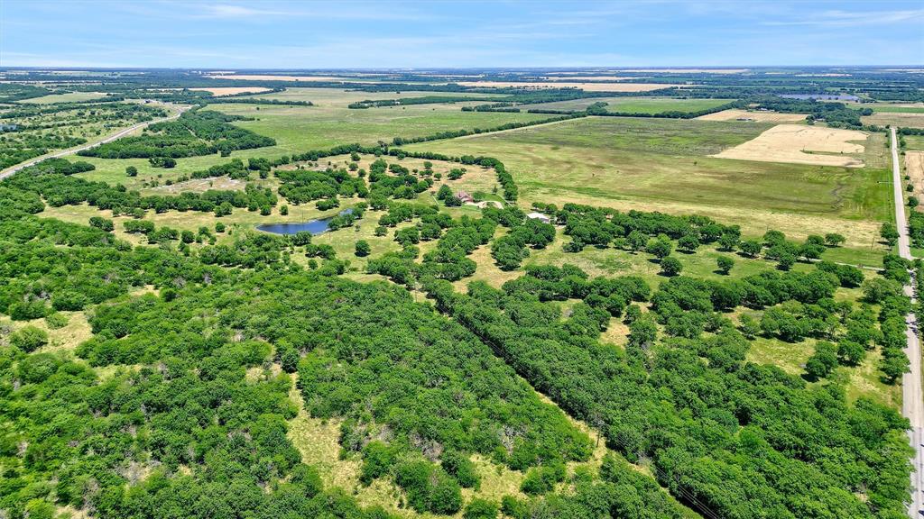 695 Mackey Road Howe, TX 75459 - Photo 11 of 30 a view of a field with an ocean view