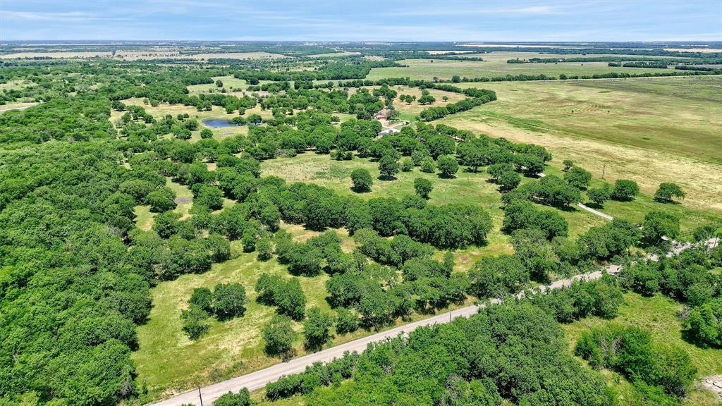 695 Mackey Road Howe, TX 75459 - Photo 12 of 30 a view of a large body of water with lots of green space