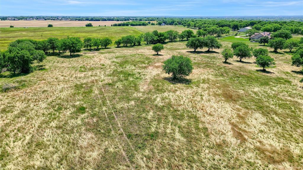 695 Mackey Road Howe, TX 75459 - Photo 8 of 30 a view of a field with an outdoor space