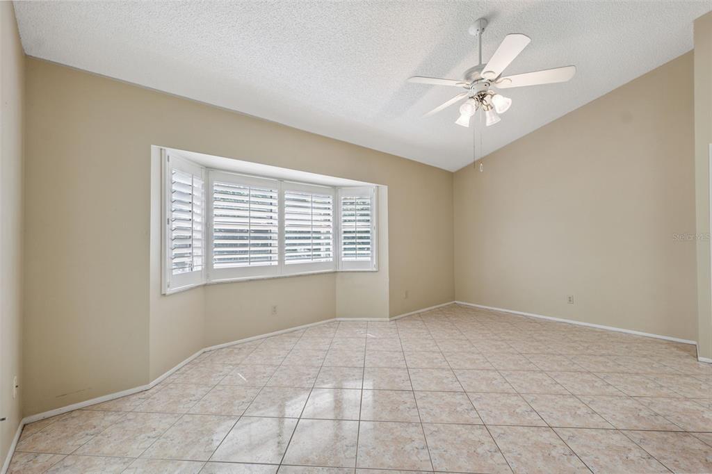 2192 Swedish Drive, Unit 26 Clearwater, FL 33763 - Photo 20 of 49 a view of an empty room with a window