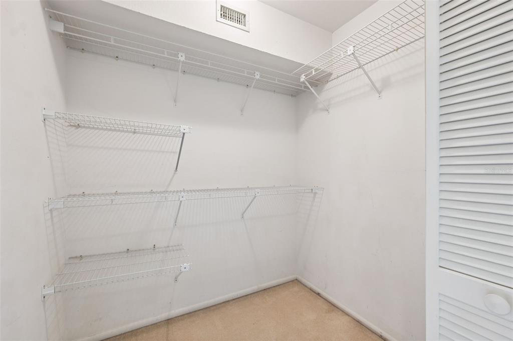 2192 Swedish Drive, Unit 26 Clearwater, FL 33763 - Photo 28 of 49 a view of an empty walk in closet