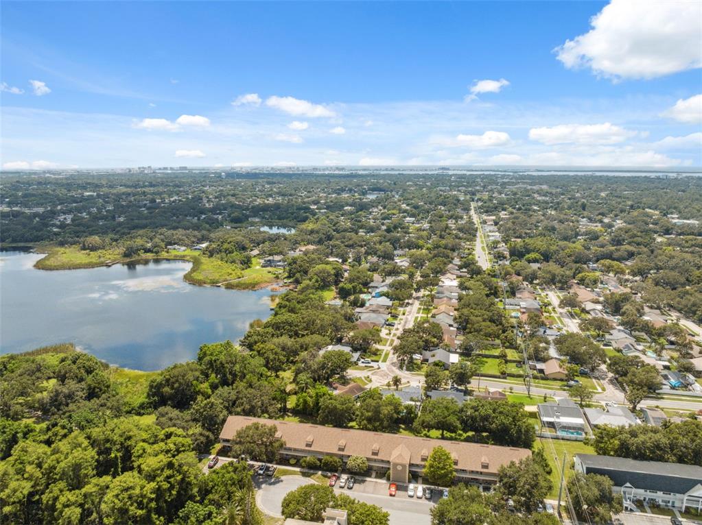2192 Swedish Drive, Unit 26 Clearwater, FL 33763 - Photo 42 of 49 an aerial view of residential building and lake view