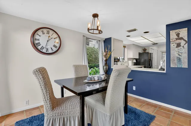 a kitchen with counter top space cabinets and stainless steel appliances