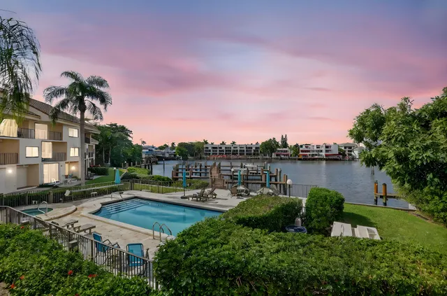 a view of entryway with stairs and a rug