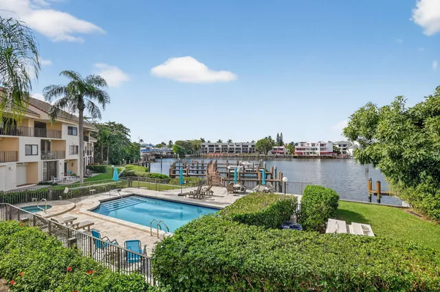 a view of backyard with garden and plants