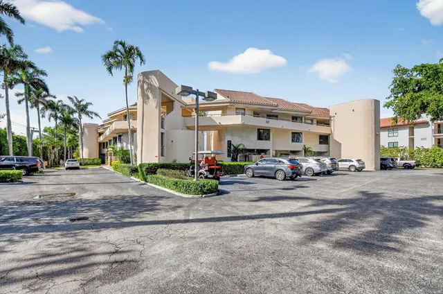 a view of entryway with furniture and wooden floor
