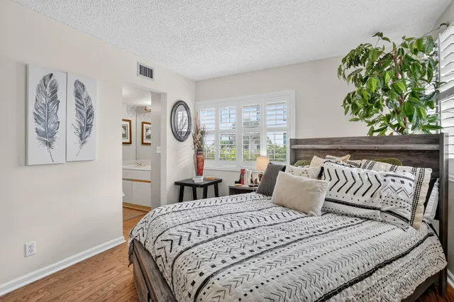 a swimming pool with outdoor seating and yard