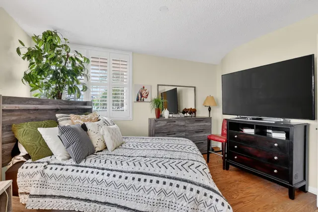 a view of a patio with swimming pool table and chairs