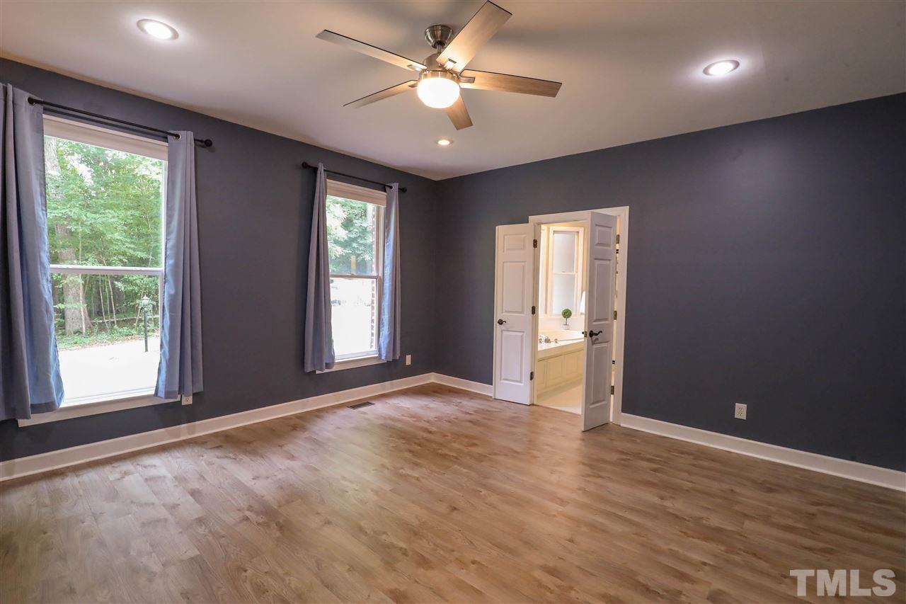 8925 Ball Road Bahama, NC 27503 - Photo 12 of 28 a view of an empty room with a window