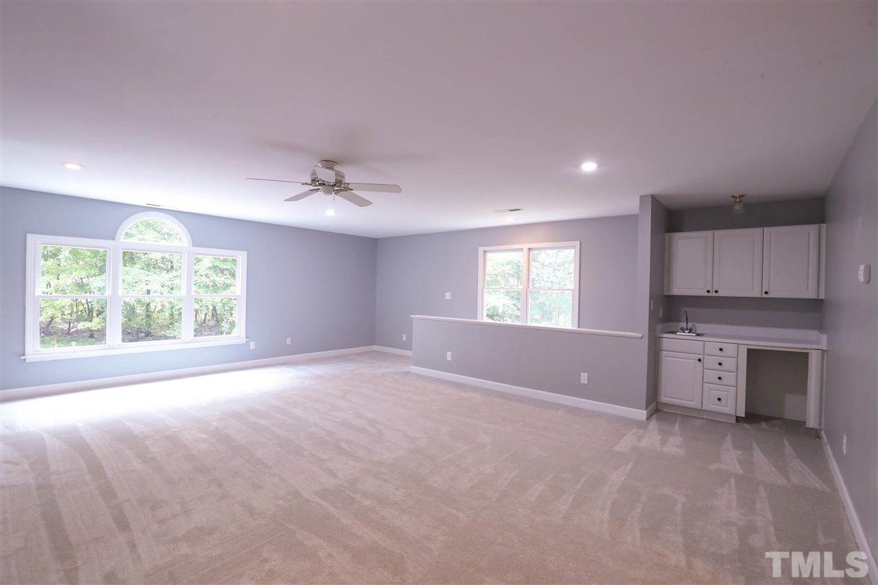 8925 Ball Road Bahama, NC 27503 - Photo 17 of 28 a view of a kitchen with a sink and a window