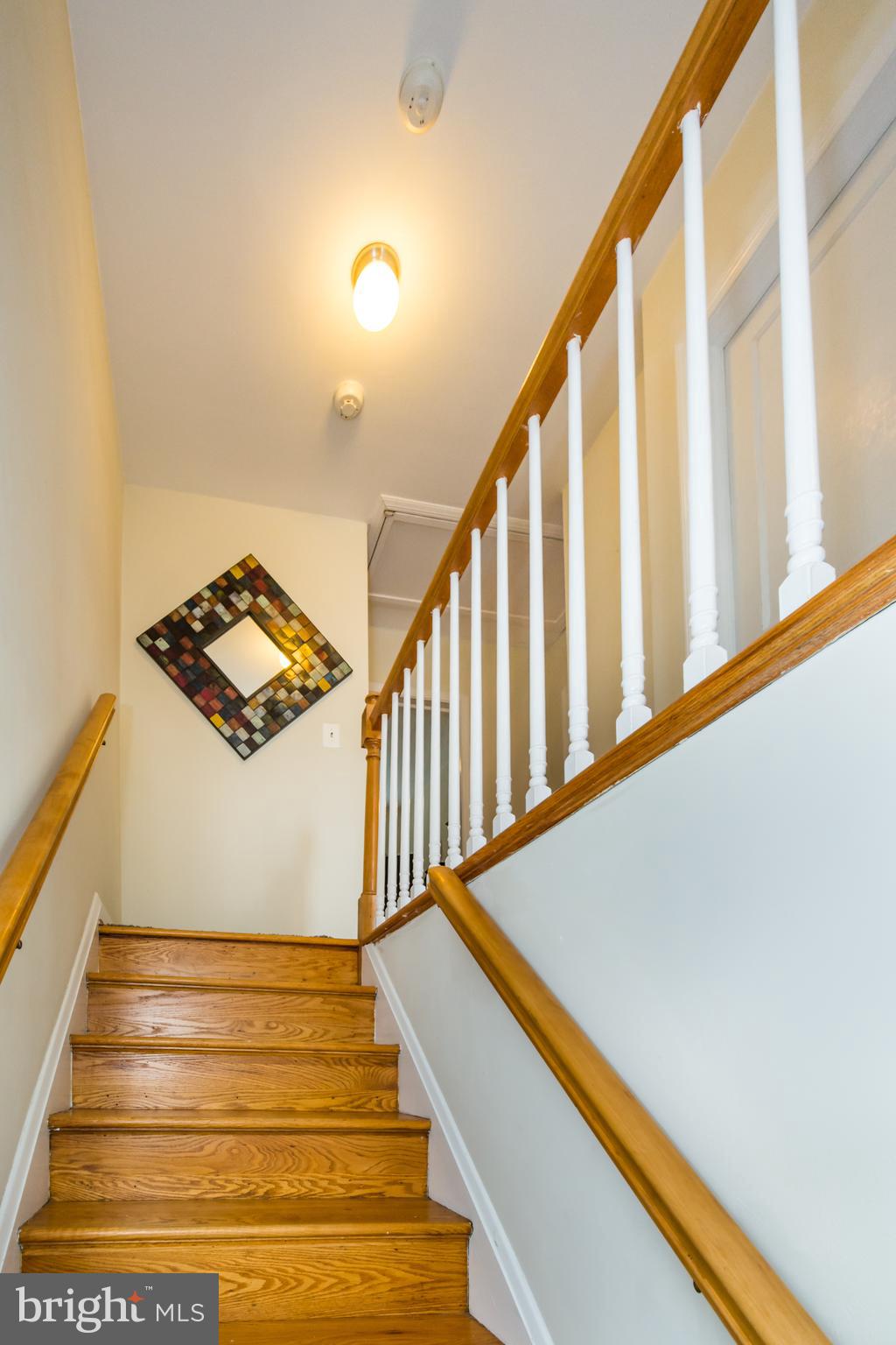 1611 Loch Ness Road Towson, MD 21286 - Photo 12 of 27 Stairway to level 2 with pull down attic stairs