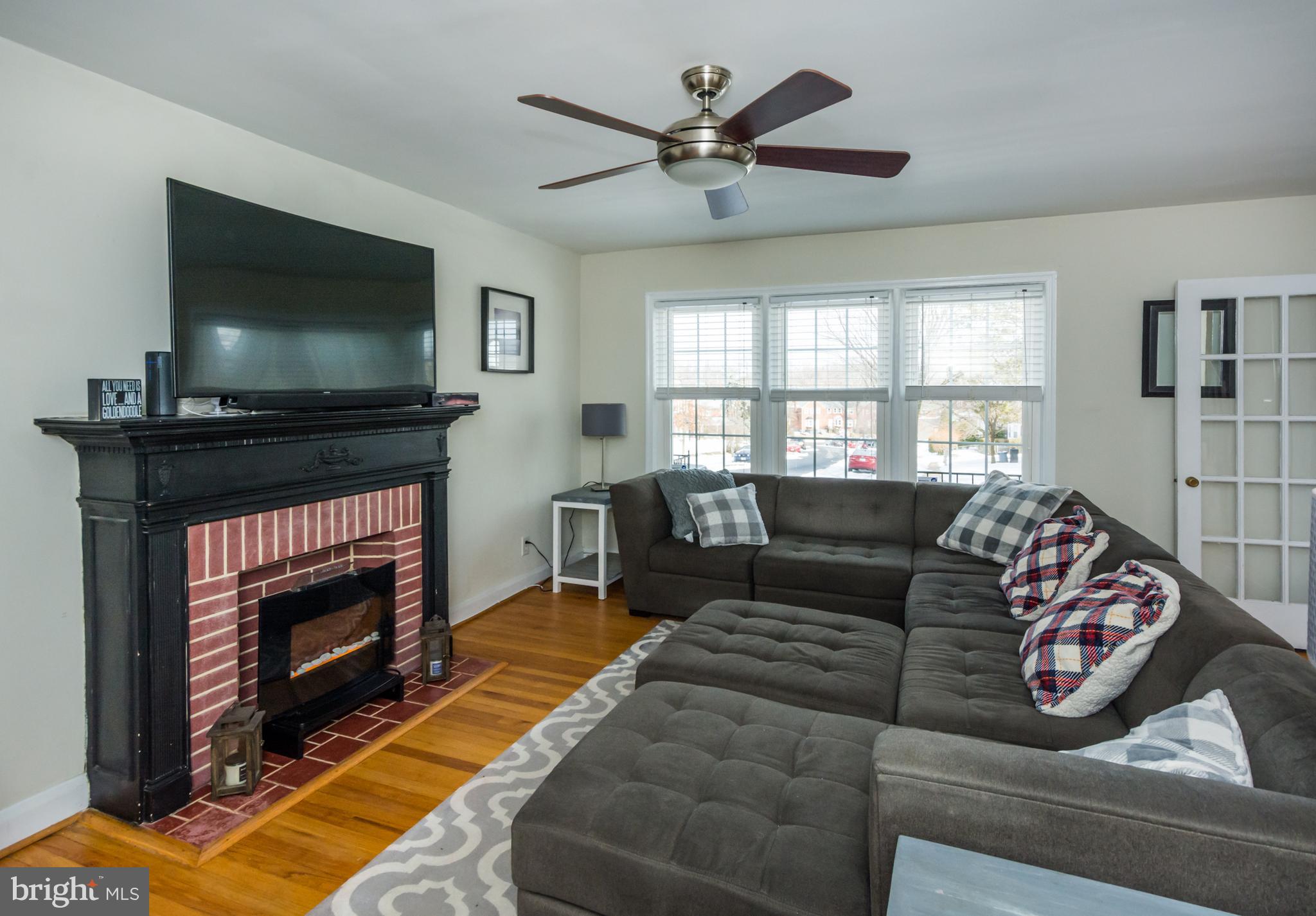 1611 Loch Ness Road Towson, MD 21286 - Photo 3 of 27 Large living room, wall mount TV included