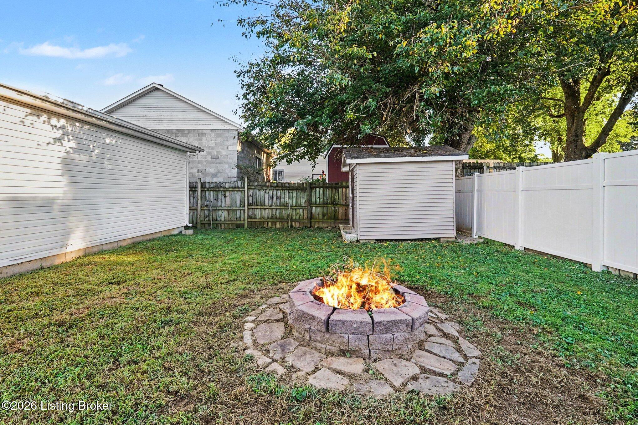 173 Crestwood Road Louisville, KY 40229 - Photo 26 of 31 enjoy fall evenings around fire pit