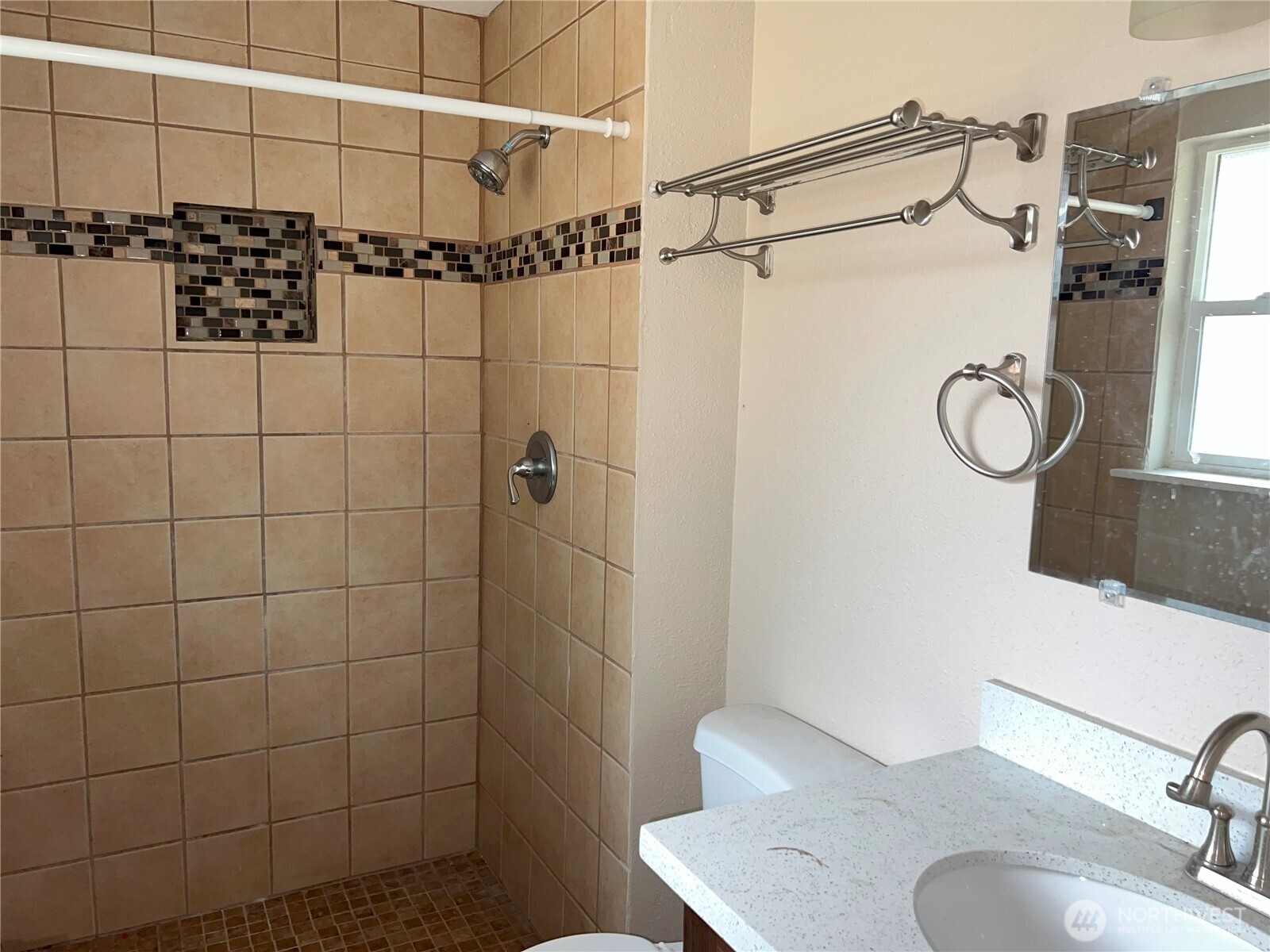 511 190th Street East Spanaway, WA 98387 - Photo 16 of 33 a bathroom with a shower