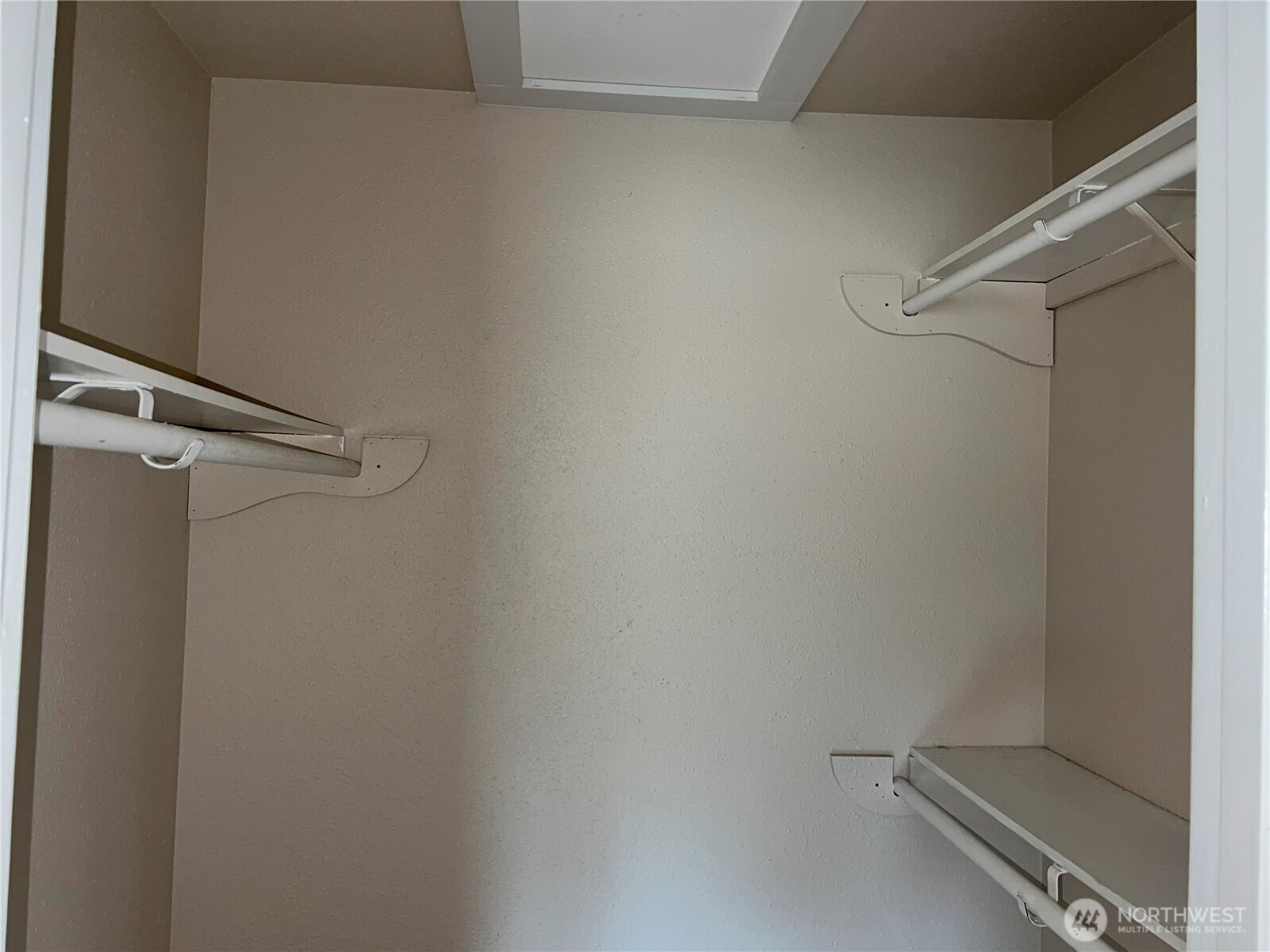 511 190th Street East Spanaway, WA 98387 - Photo 19 of 33 a view of a room with racks on the wall