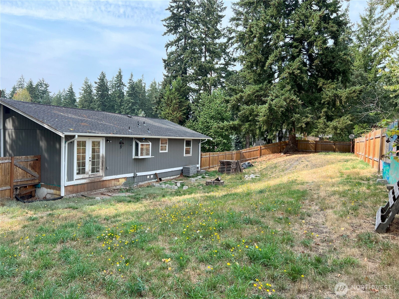 511 190th Street East Spanaway, WA 98387 - Photo 28 of 33 a view of a house with a yard