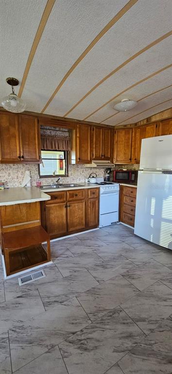 1727 Button Street, Unit 180 Holiday, FL 34690 - Photo 6 of 21