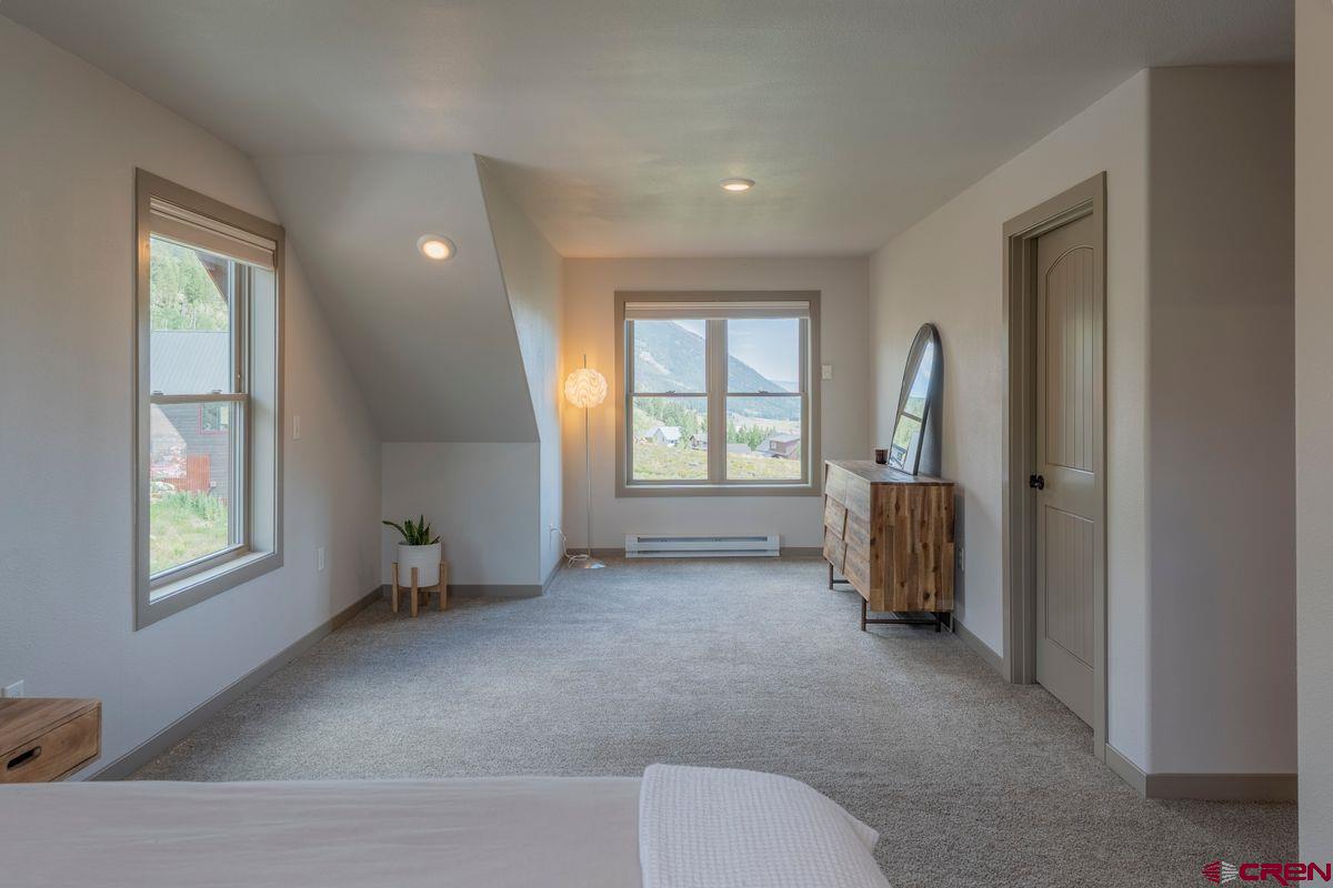 334 Anderson Drive Crested Butte, CO 81224 - Photo 19 of 45 an empty room with windows and closet