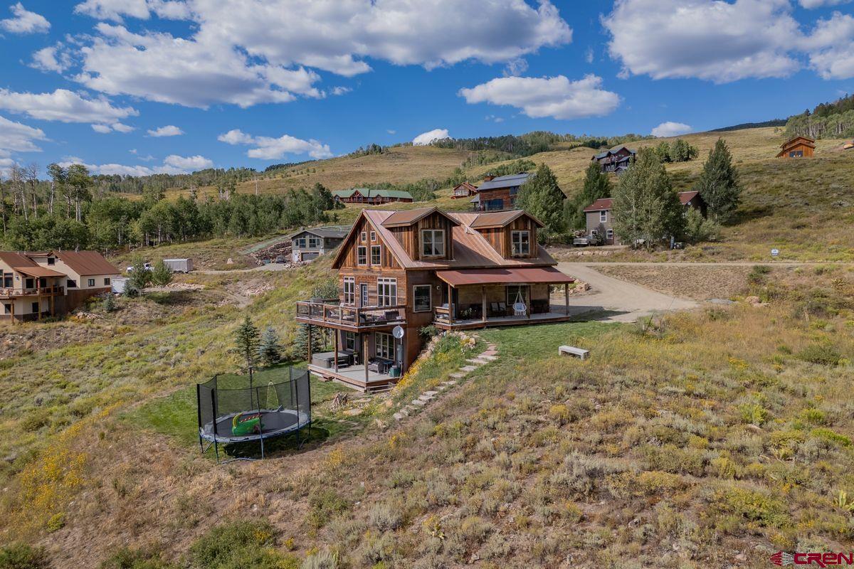 334 Anderson Drive Crested Butte, CO 81224 - Photo 40 of 45 a aerial view of a house with a yard
