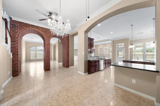 a large living room with a large window