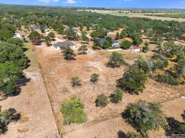 a view of a yard with an outdoor space