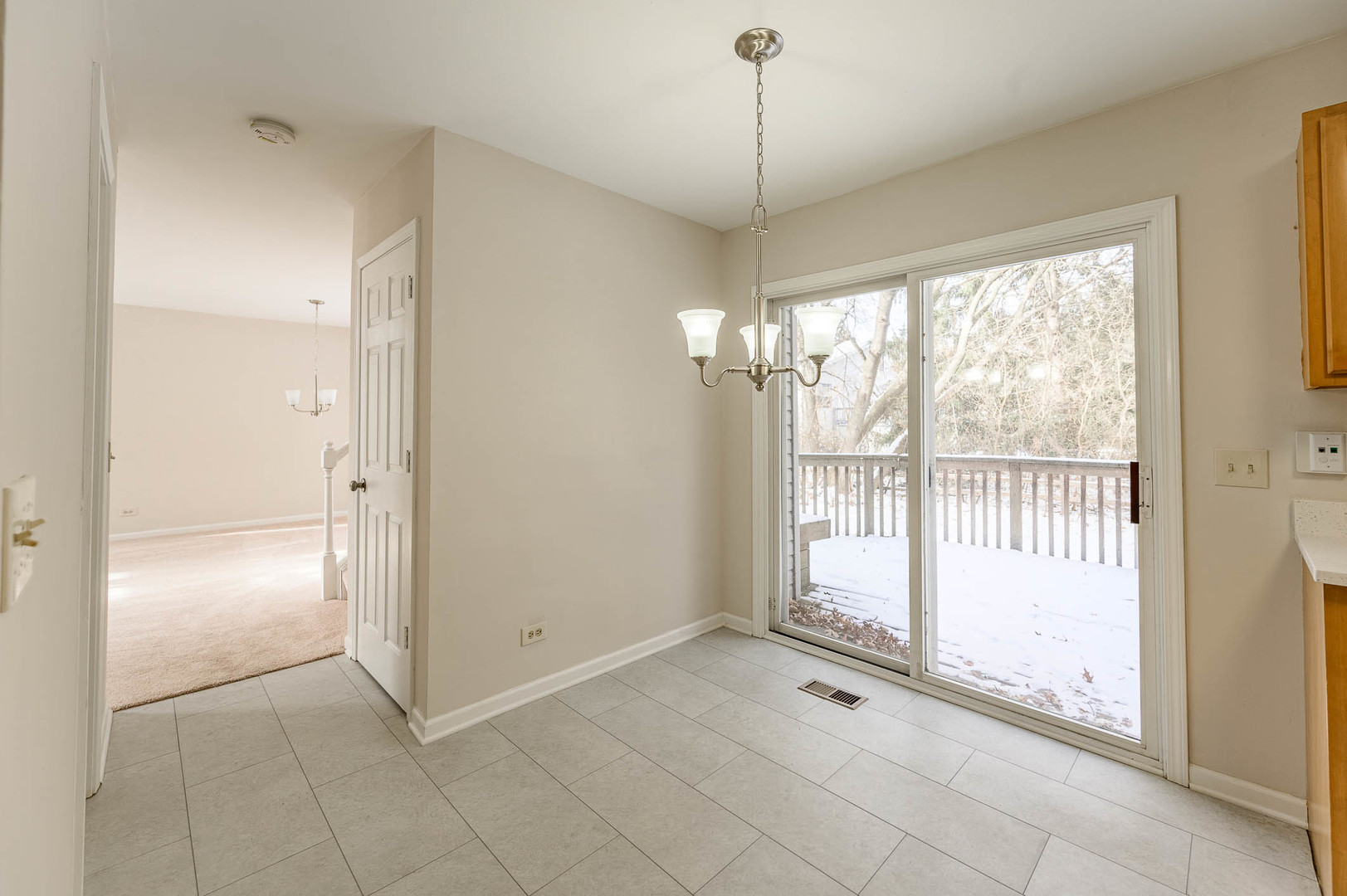 2284 North Pheasant Ridge Court Round Lake Beach, IL 60073 - Photo 5 of 11 a view of an empty room with a window