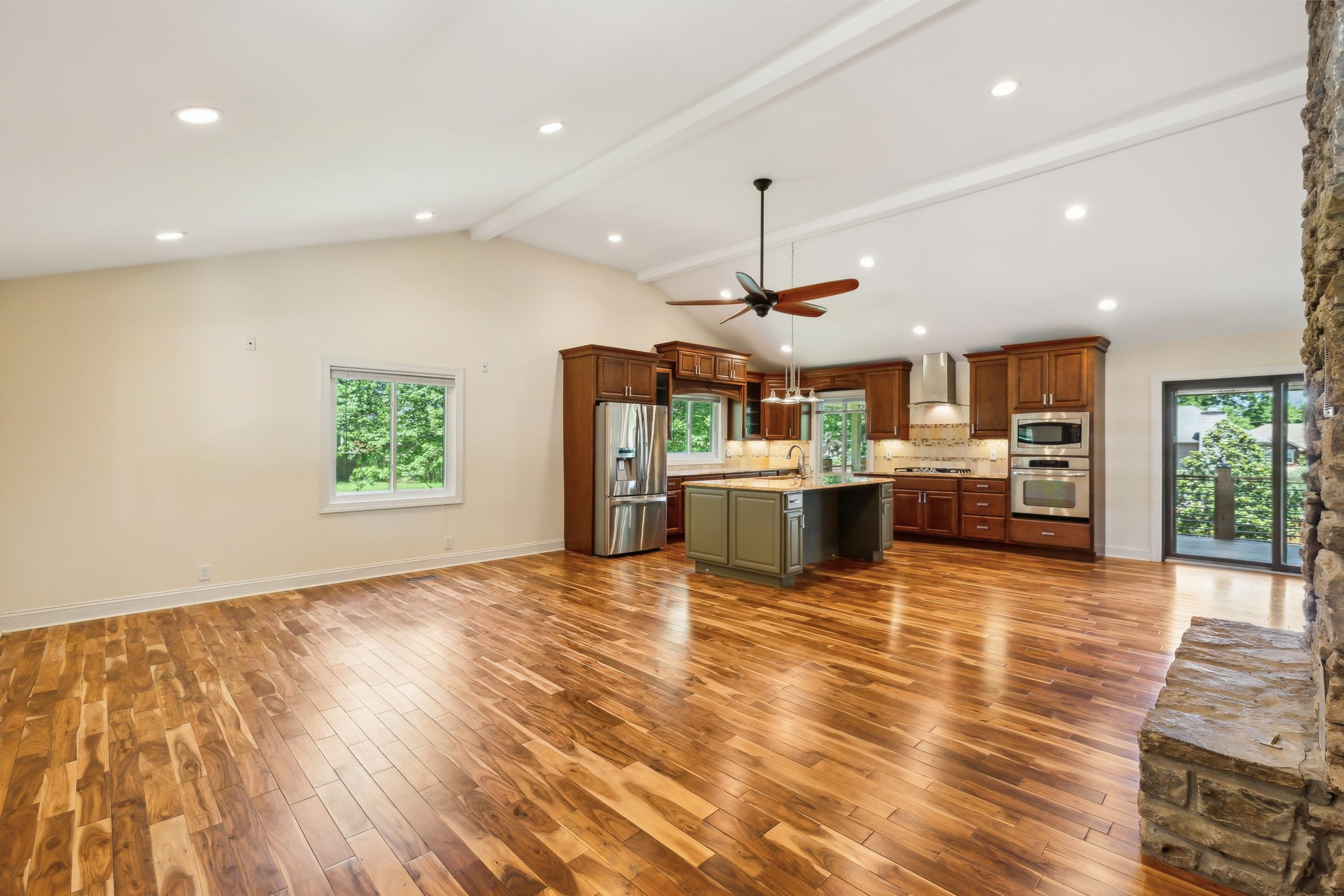 8166 Poplar Creek Road Nashville, TN 37221 - Photo 11 of 63 a view of a kitchen with kitchen island a counter top space appliances and cabinets