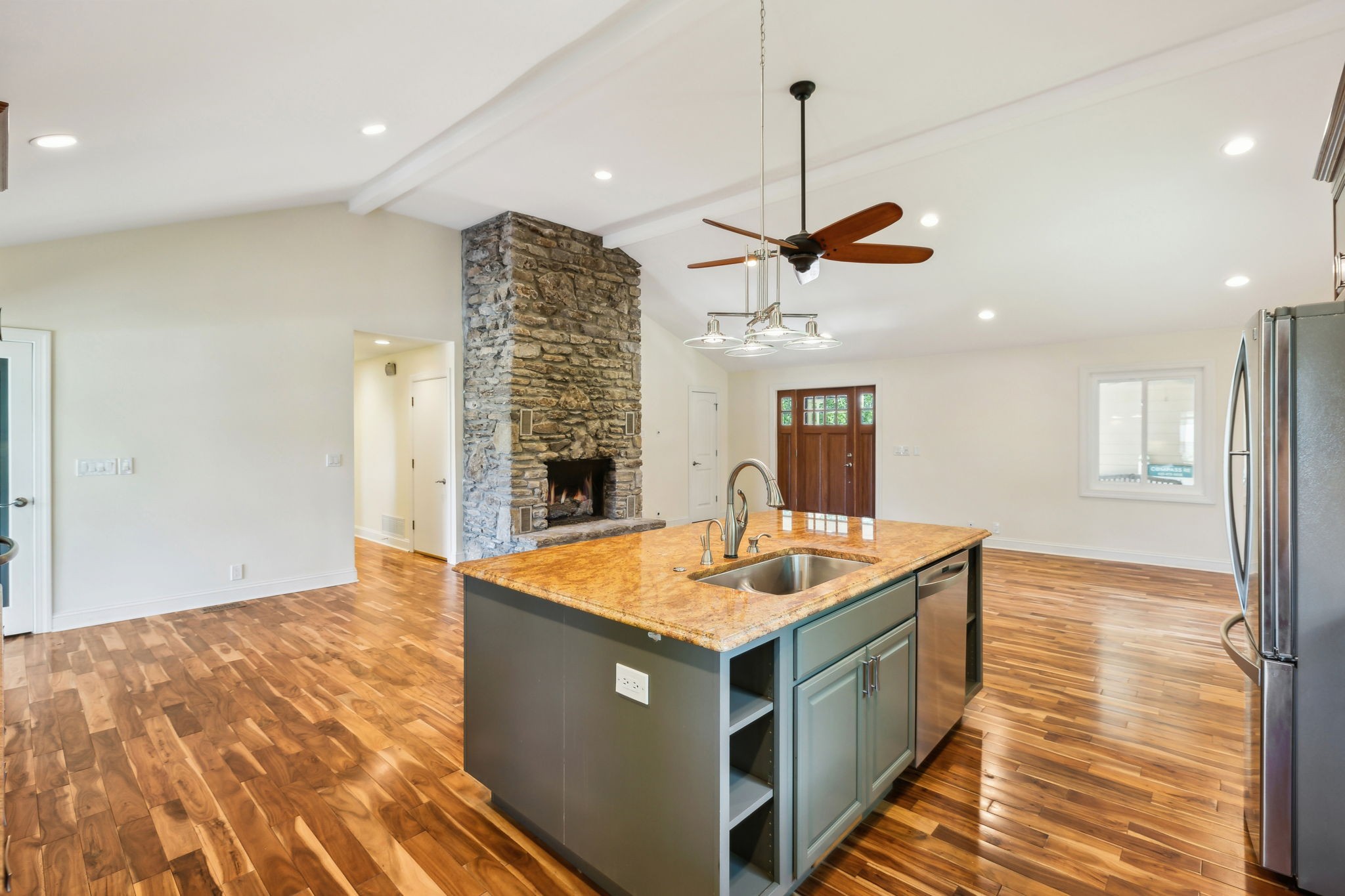 8166 Poplar Creek Road Nashville, TN 37221 - Photo 13 of 63 a kitchen with a stove and a sink