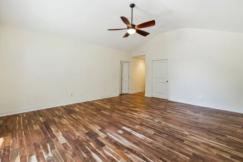 a bathroom with a sink a mirror and a window
