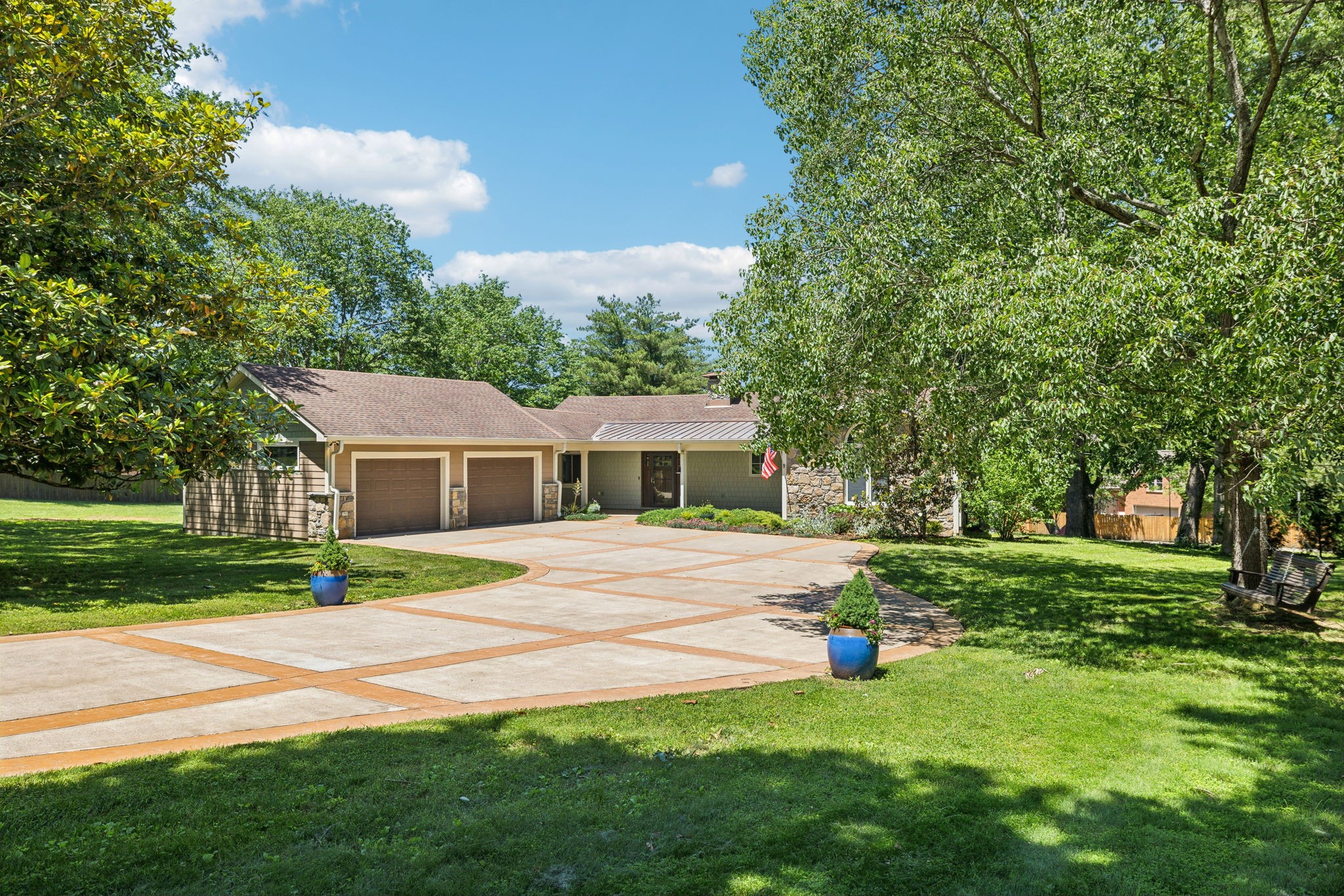 8166 Poplar Creek Road Nashville, TN 37221 - Photo 2 of 63 a view of a house with a backyard